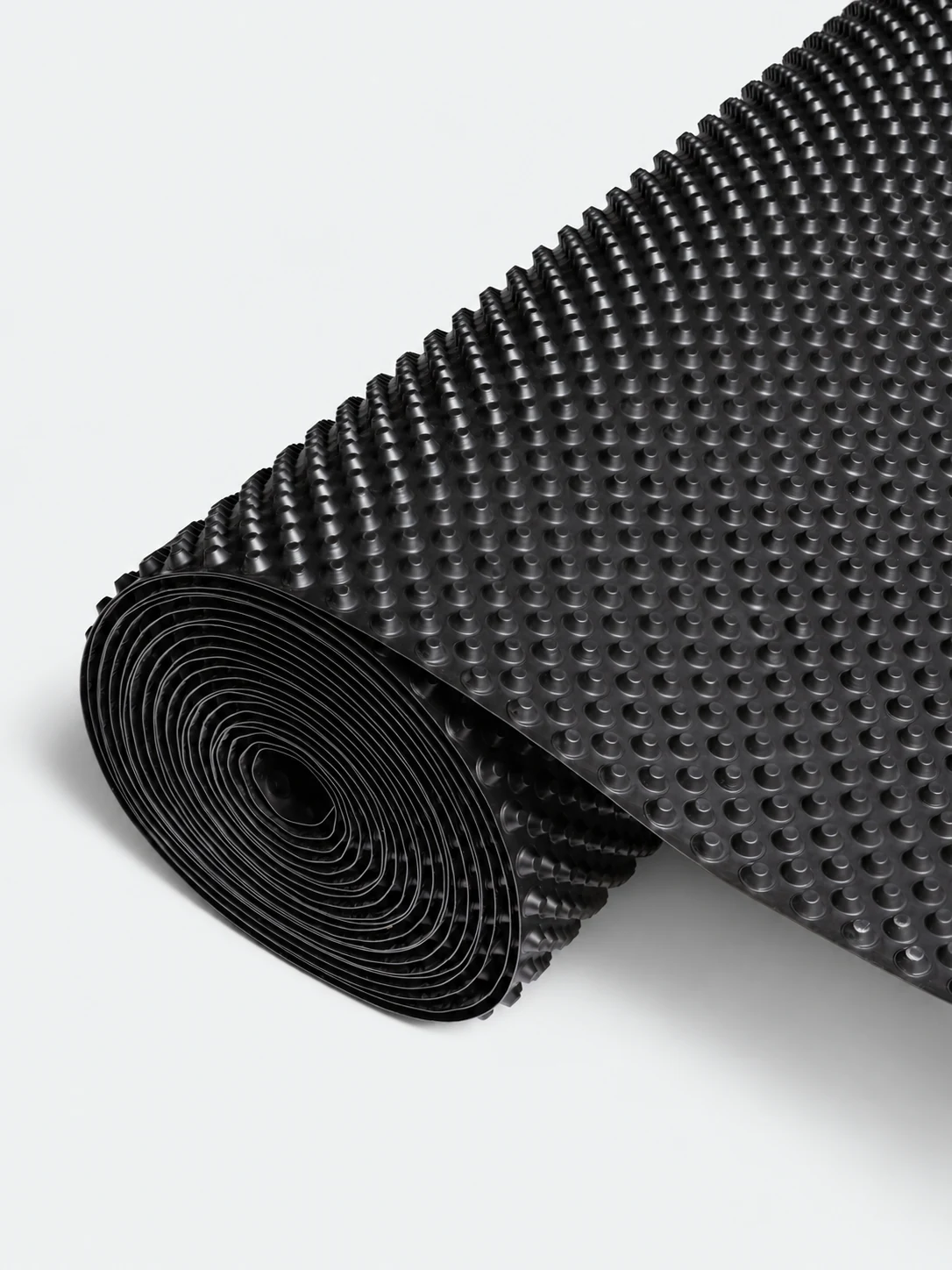 Qora HDPE profilli membrananing yoyilgan ruloni Qora HDPE profilli membrananing yoyilgan ruloni